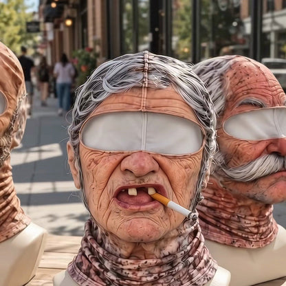 Close-up of the Grandma mask on a white bust: wrinkles, brows, nose, gap teeth and cigarette, city street behind.