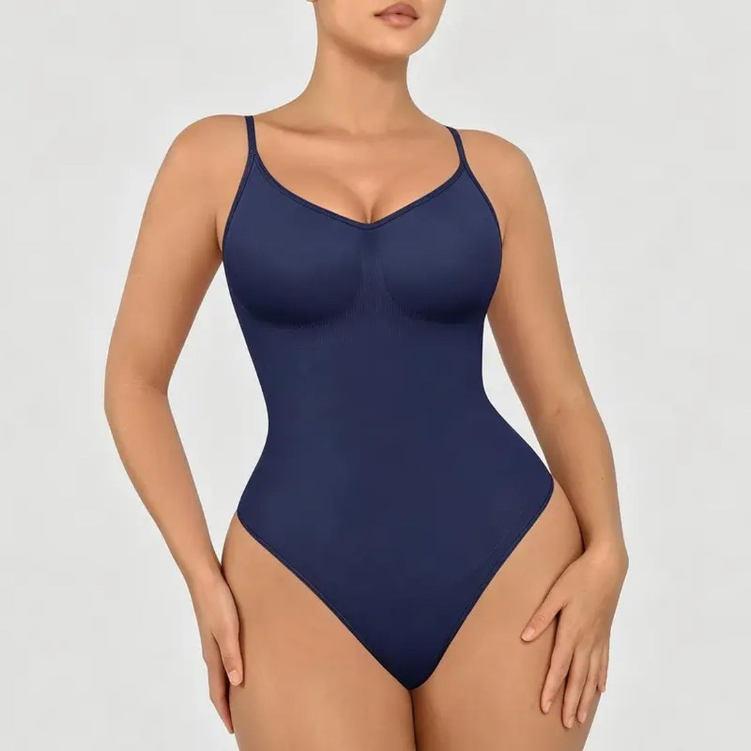 The product's own listing photo: the navy thong bodysuit on the body, cropped torso, plain gray background.