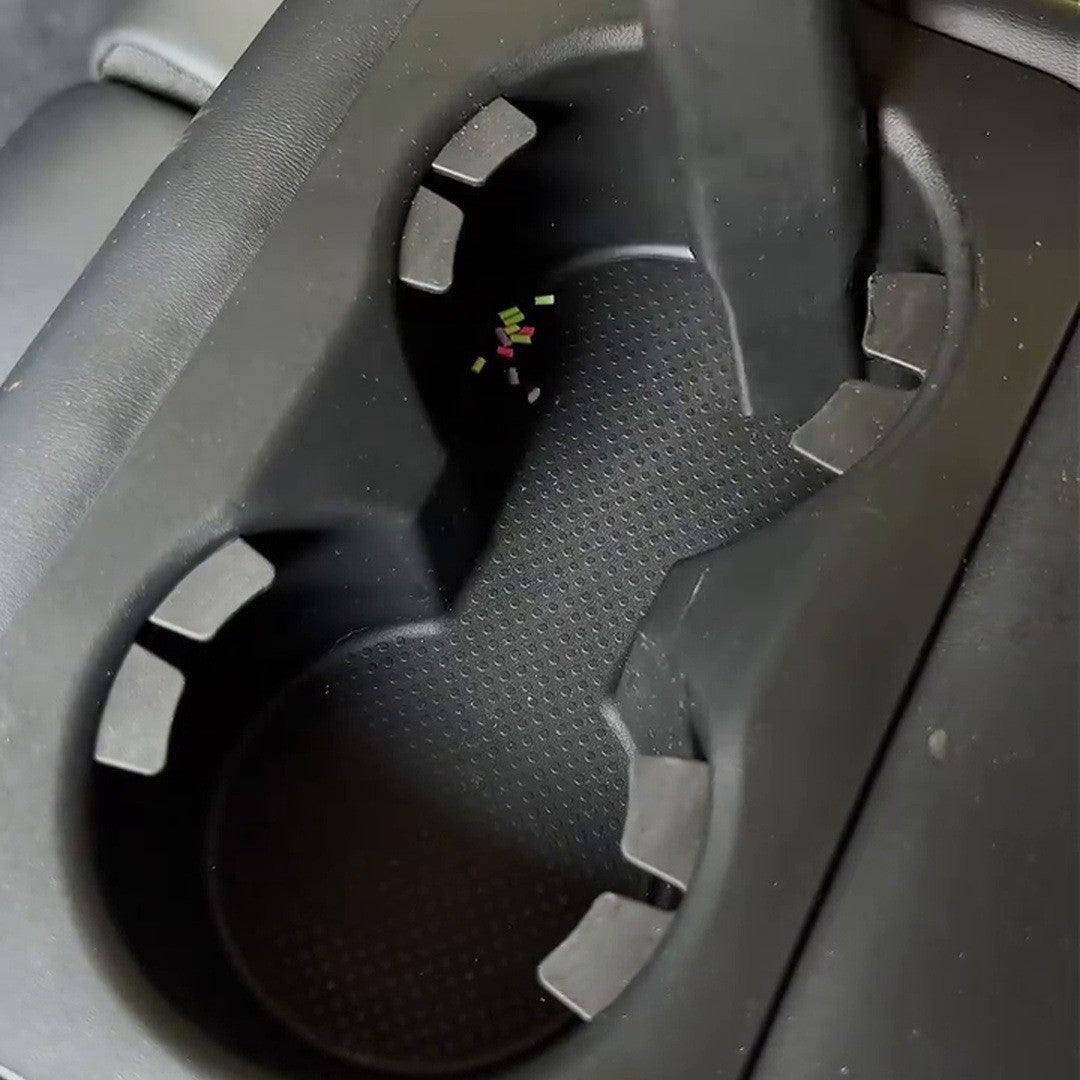 Slim attachment reaching into a car cup holder