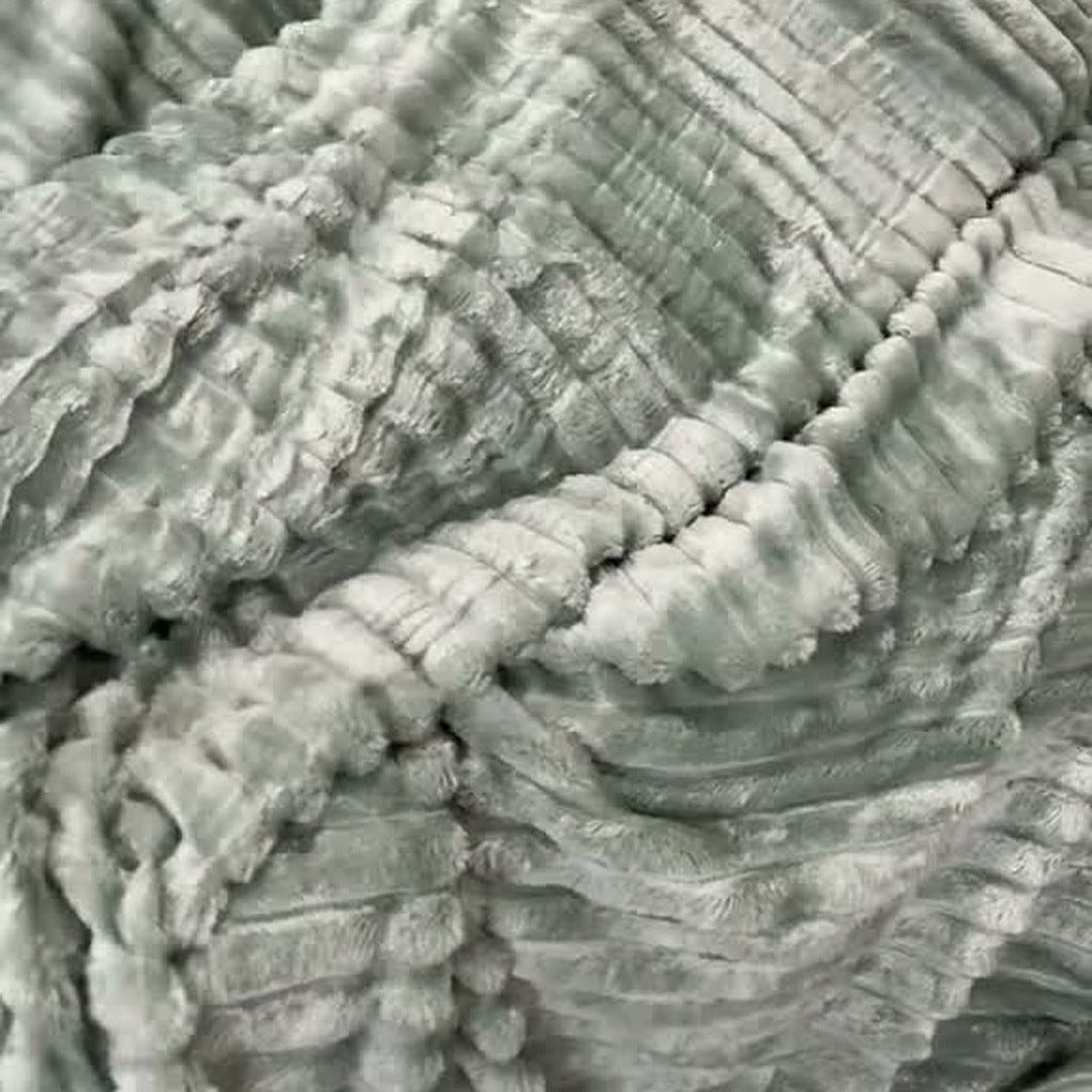 The Sage ribbed plush blanket in calm folds, product only