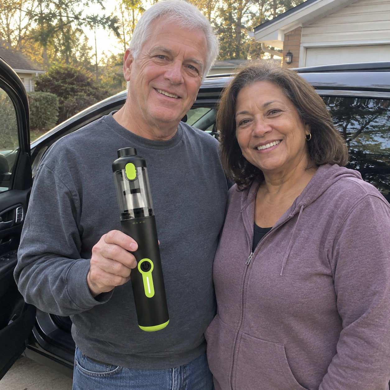 Older couple holds the intact cordless vacuum