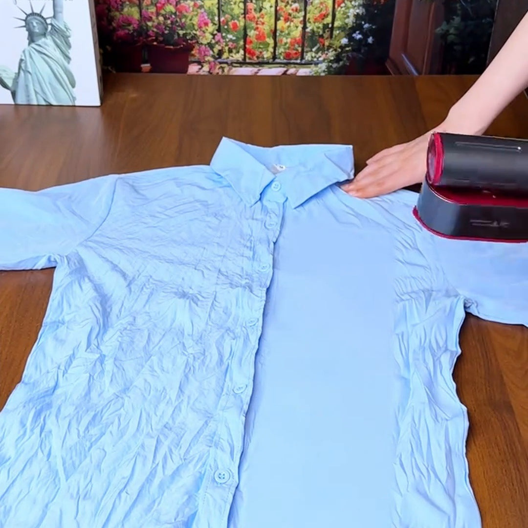 Actual steamer presses flat blue shirt showing wrinkled and smoother sections