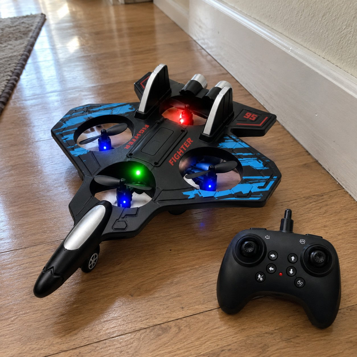 The jet and remote on a hallway wood floor