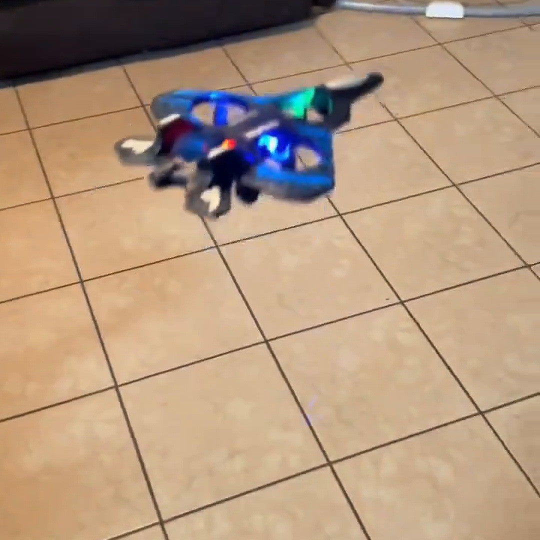 Stunt jet hovering low over a tiled living room floor